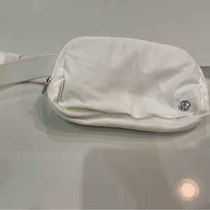 Pure white Lululemon everywhere belt bag extended version.